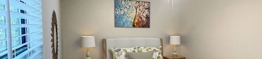 a bedroom with a bed and a ceiling fan at The Junction, Memphis, TN, 38111