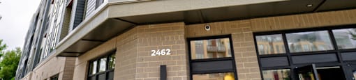 A building with a sign that says "2462" on the front.