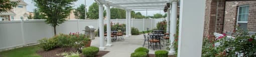 Lovely shared patio seating with grilling station