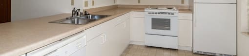 Bright white kitchens at Westminster Senior Apartment Homes