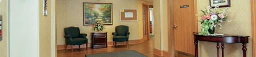Large hallways with rich wood flooring