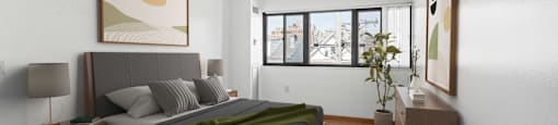 a bedroom with a bed and a window