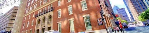 a tall brick building on the corner of a city street  at 140 Clarendon, Boston, MA, 02116