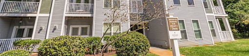 Three story apartment buildings with balconies at Woodlands at Abington Station Apartments, Massachusetts, 2351