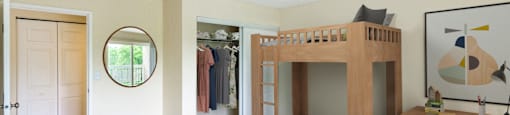 a bunk bed in a room with a desk and a mirror at North Stoughton Village, Massachusetts, 02072