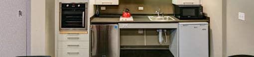 Community Room Kitchen at Georgetowne Homes Apartments, Massachusetts