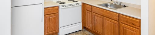 Fully Applianced Kitchen at Olympia Place Apartments.