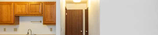 Entrance and Kitchen of Apartment at Olympia Place Apartments.