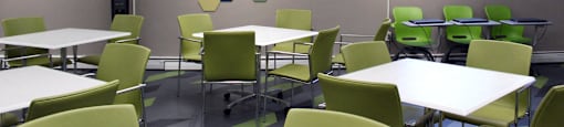 Community Clubroom With Tables And Chairs at Stratton Hill Park Apartments in Worcester, MA.