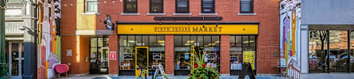 a crosswalk in front of a store on a city street at Ninth Square Apartments, New Haven, CT