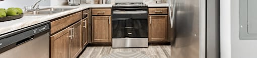 Kitchen With Wooden Cabinets And Stainless Steel Appliances at Niagara Square, New York, 14201