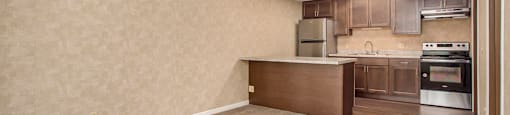a kitchen and dining area in a 555 waverly unit