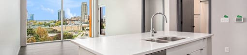 234 Market Apartments In Grand Rapids, MI With Spacious Open Concept Living Areas With Modern Kitchens & Quartz Countertops