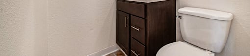 a bathroom with a toilet and a sink