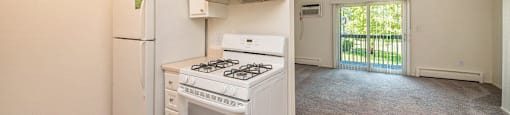 the preserve at ballantyne commons apartment kitchen with stove and refrigerator