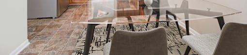 a kitchen and dining room with a glass table and chairs