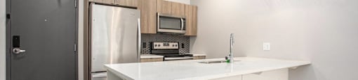 234 Market Apartments In Grand Rapids, MI With Spacious Open Concept Living Areas With Modern Kitchens & Quartz Countertops