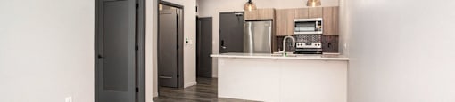 234 Market Apartments In Grand Rapids, MI With Spacious Open Concept Living Areas With Modern Kitchens & Quartz