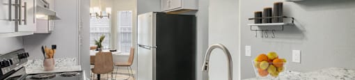 a kitchen with a granite counter top and a stainless steel refrigerator
