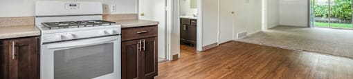 a kitchen and living room in a 555 waverly unit