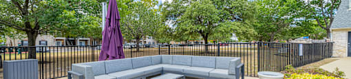 the reserve at bucklin hill leasing office patio with couches and tables