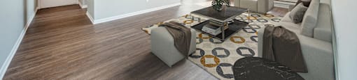a living room with a couch and a table
