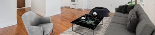 a living room with a couch and a coffee table