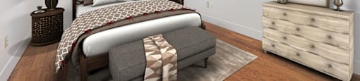 a bedroom with a bed and a dresser and a window