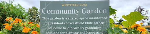 a sign for the community garden