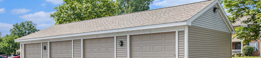 a three car garage with a garage door on each side of the garage