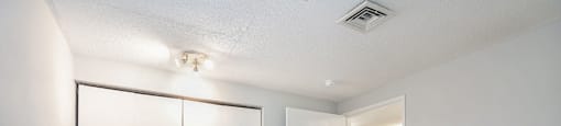The Lofts Apartments in Grand Rapids, MI Spacious bedroom with upgraded hardwood fooring