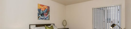 Spacious Bedroom With Comfortable Bed at Highland Village Apartments, Flagstaff, AZ, 86001