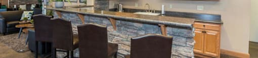 Eat-In Table With High Chairs In Clubhouse at Highland Village Apartments, Flagstaff