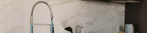 Kitchen - Elevated Finishes at Arrowwood Apartments in North Bethesda, MD 20852