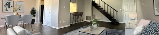 a living room with a couch and a table