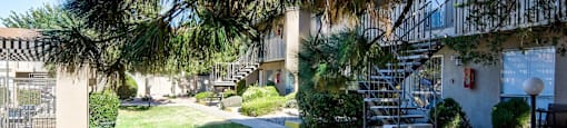 A sunny day at the courtyard of a residential building.