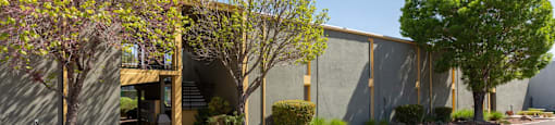 A building with a green wall and a yellow door.