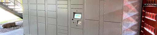 A large grey electrical panel with a digital display and control panel.