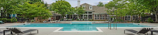 the swimming pool at the estates apartments