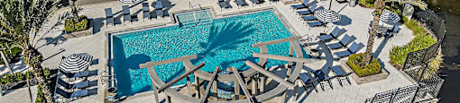an aerial view of the pool at the resort at longboat key club