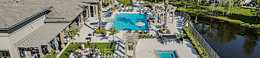 an aerial view of the pool and patio area at the resort