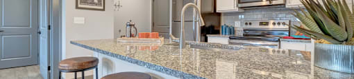 Kitchen with White Shaker Cabinetsat Latitude at South Portland Apartment, Maine, 04106