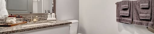 Beautiful White Cabinetry in Bathroom at Latitude at South Portland Apartment, Maine, 04106