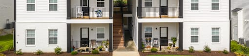 Exterior building with patios and balconies at Highland Hills Apartments in Grovetown, Georgia