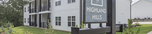 Exterior sign at Highland Hills Apartments