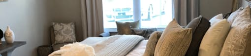 Bedroom With Expansive Windows  at Highland Hills Apatrtments, Grovetown, Georgia