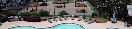an aerial view of a swimming pool with chairs at Preserve  at Mill Creek, Georgia 30519