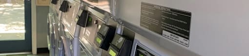 Prodesse Property Group 1135 Bird Avenue San Jose, CA 95125 a row of automated parking machines in a building