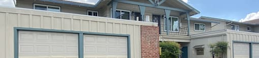 White garages with blue trimmings