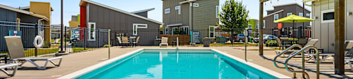 A swimming pool in a sunny day.